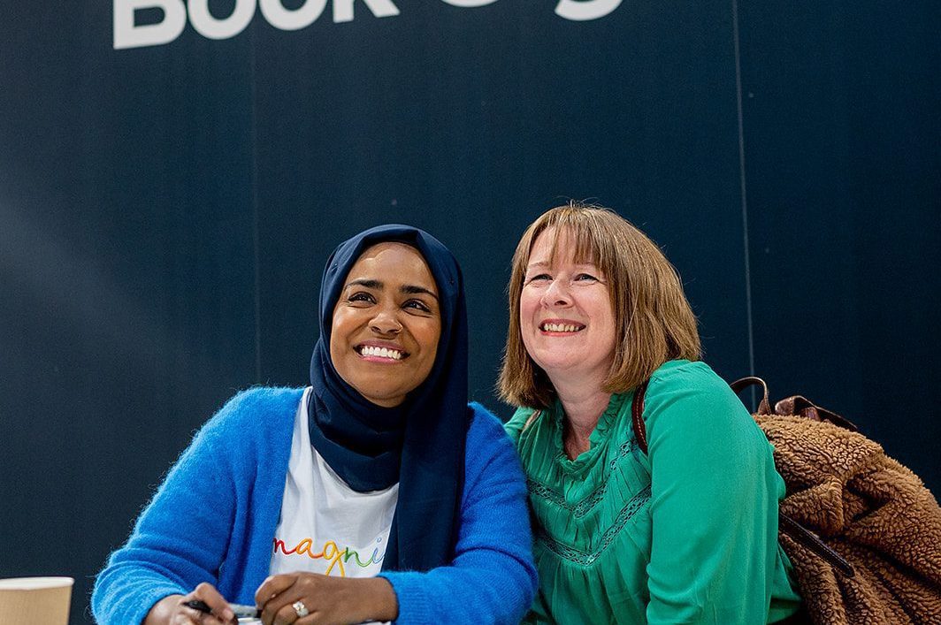 Nadiya Hussain with fan at book signing at BBC Good Food Show